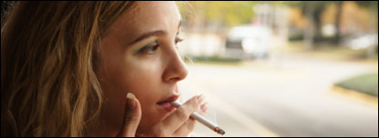 a young woman smoking